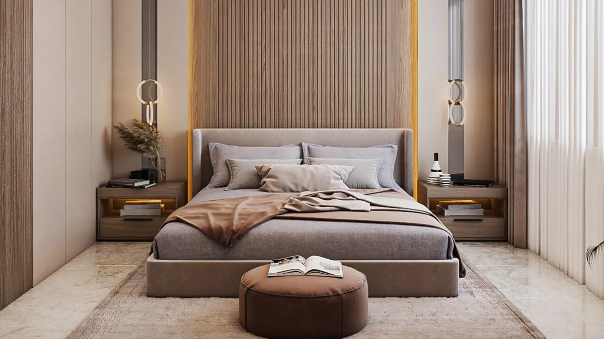 Modern and spacious lobby of Ganaga Anantam building with marble floors, reception desk, warm lighting, and people inside